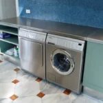 http://brookscustom.com/wp-content/uploads/2024/08/39-Laundry-room-with-Stainless-steel-countertop-150x150-1.webp