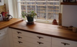 Teak Edge Grain Wood Countertop in a White Kitchen