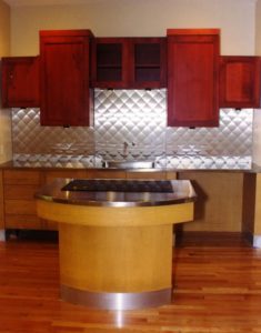 custom stainless steel backsplash with quilt texture