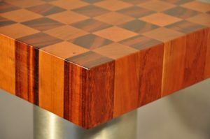 end grain butcher block wood countertop with mixed cherry and tigerwood pattern