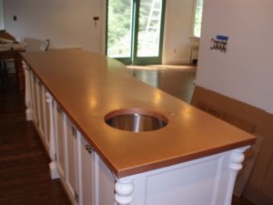 copper counter top, matte copper countertop with an undermount sink cutout for a kitchen island