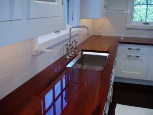 wide plank wood, premium wide plank countertop, polished wood countertop, waterproof countertop, classic white kitchen