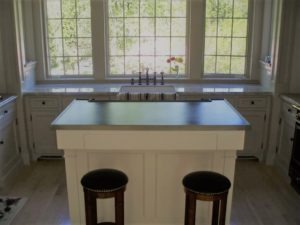 country kitchen, stainless steel kitchen island, stainless steel countertops, metal countertop, white cabinets