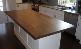Crisp Modern Kitchen with Walnut Island Wood Countertop