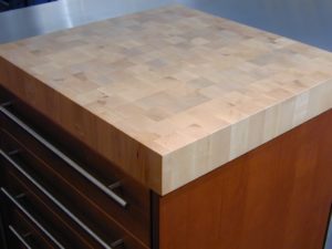 end grain butchers block, small kitchen island with an end grain maple butcher block wood countertop