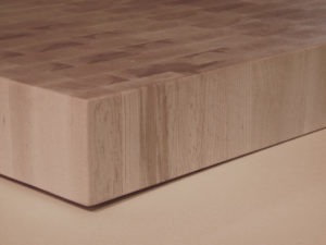 end grain butchers block, eased square edge close-up on a maple end grain butcherblock wood countertop