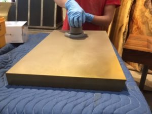 repair a cold cast countertop, metal countertops, cold cast metal, sanding countertop