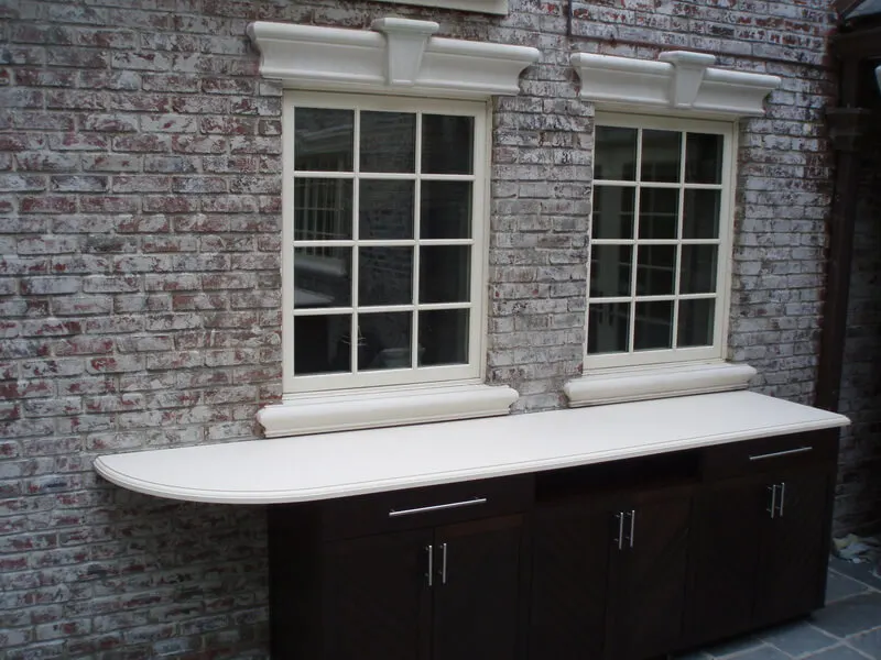 Engineered white concrete bar top is perfect in an outdoor setting and stands up to the weather.